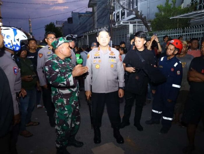 KETAT. Pengamanan ketat diberlakukan usai perang kelompok selama lima hari di Jalan Kandea, Kecamatan Tallo, Makassar.